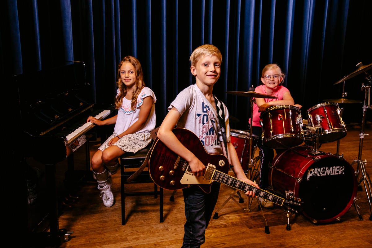 Achtergrondafbeelding Muziekinstrumenten uitproberen bij Muziekmeesters